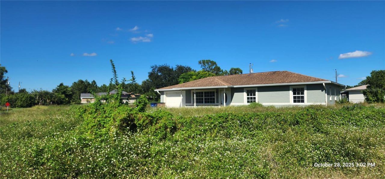 320 Plumosa Avenue, Lehigh Acres, FL 33936 Photo