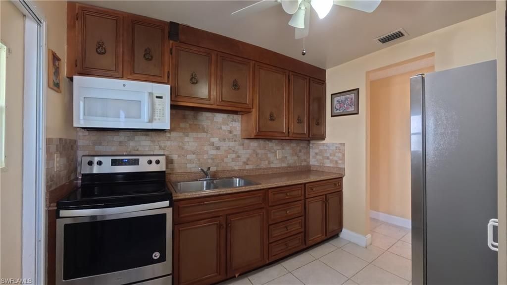 10 Dawn Flower Cir, Lehigh Acres, FL 33936 Photo