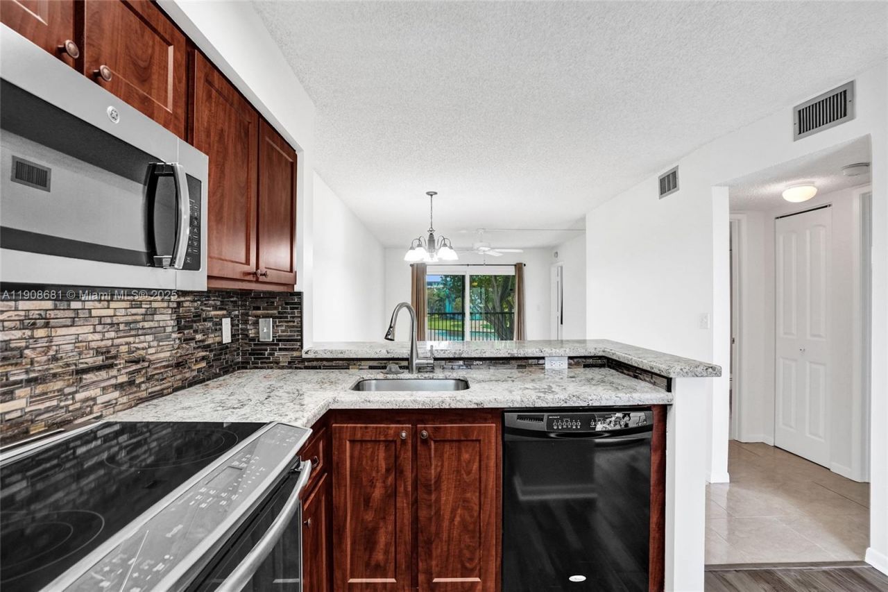 2220 N Cypress Bend Dr, Unit 310, Pompano Beach, FL 33069 Photo