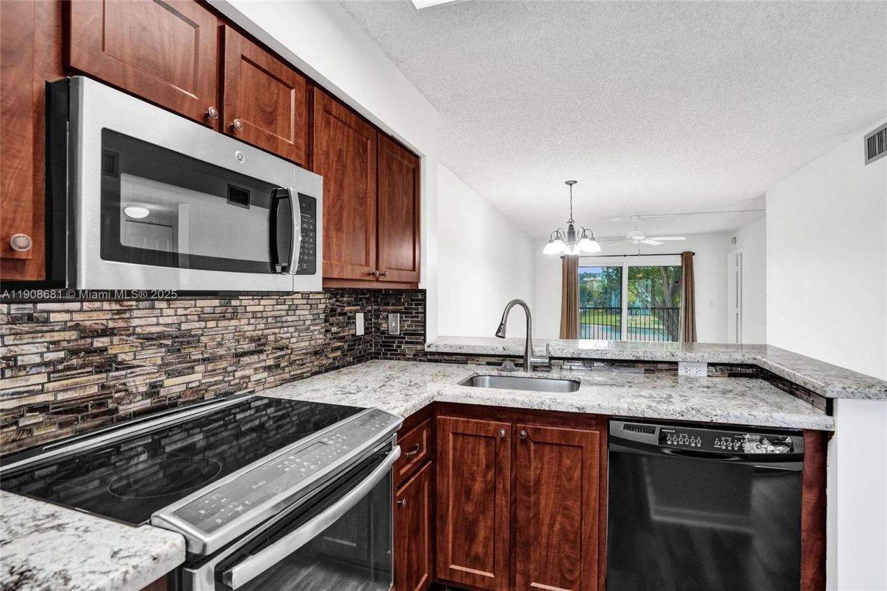 2220 N Cypress Bend Dr, Unit 310, Pompano Beach, FL 33069 Photo