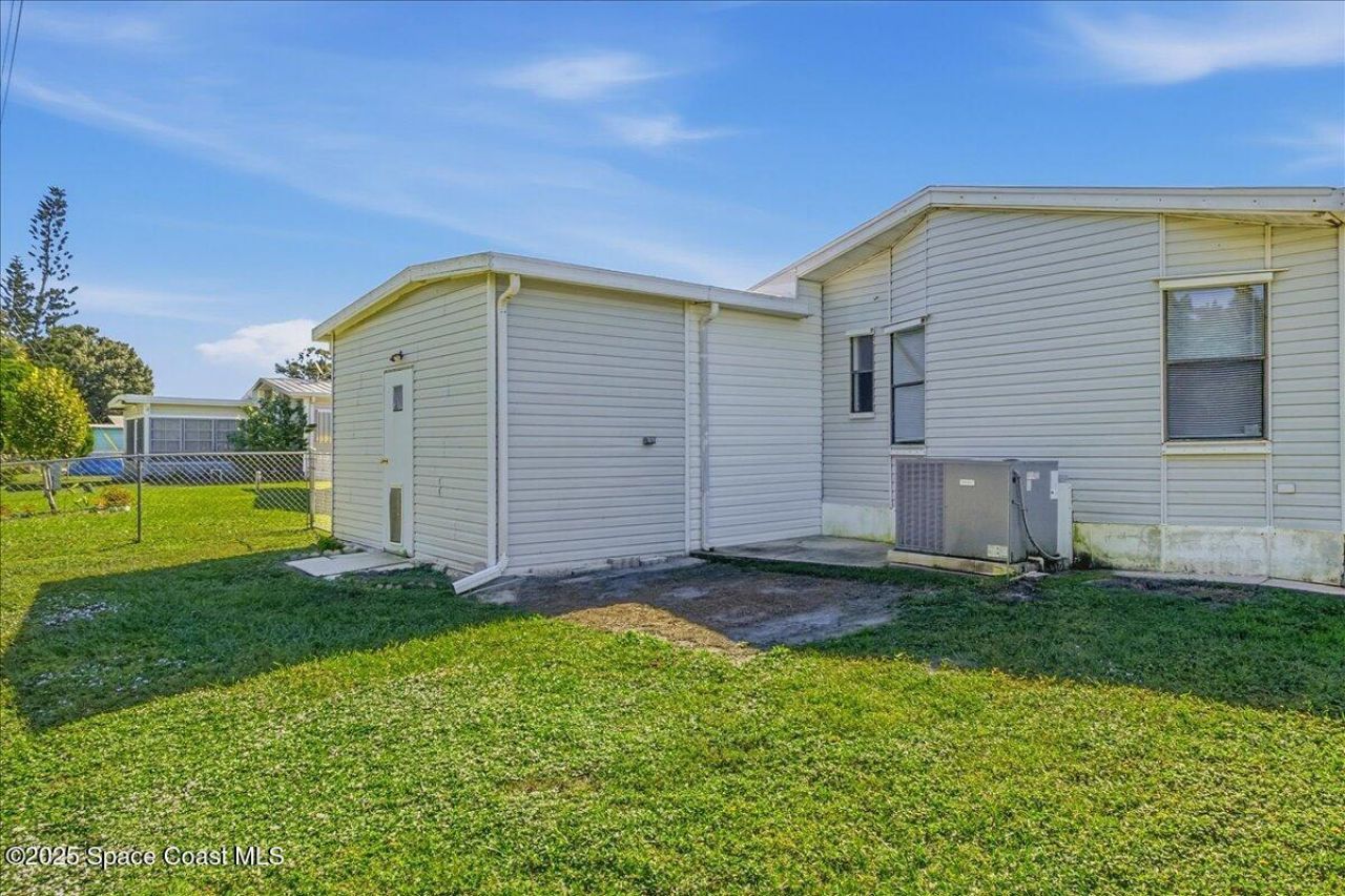 1131 Tequesta Drive, Barefoot Bay, FL 32976 Photo