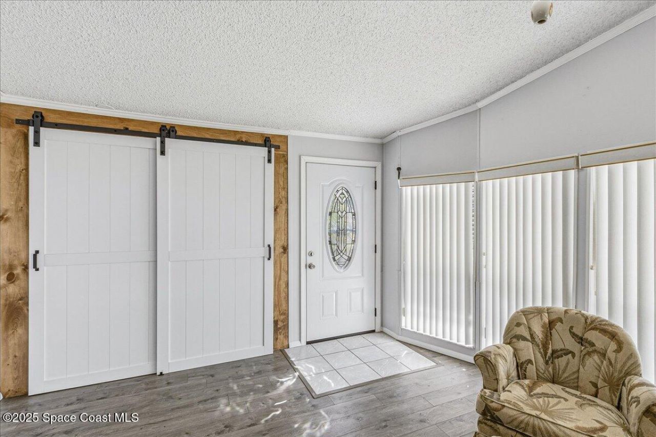 1131 Tequesta Drive, Barefoot Bay, FL 32976 Photo