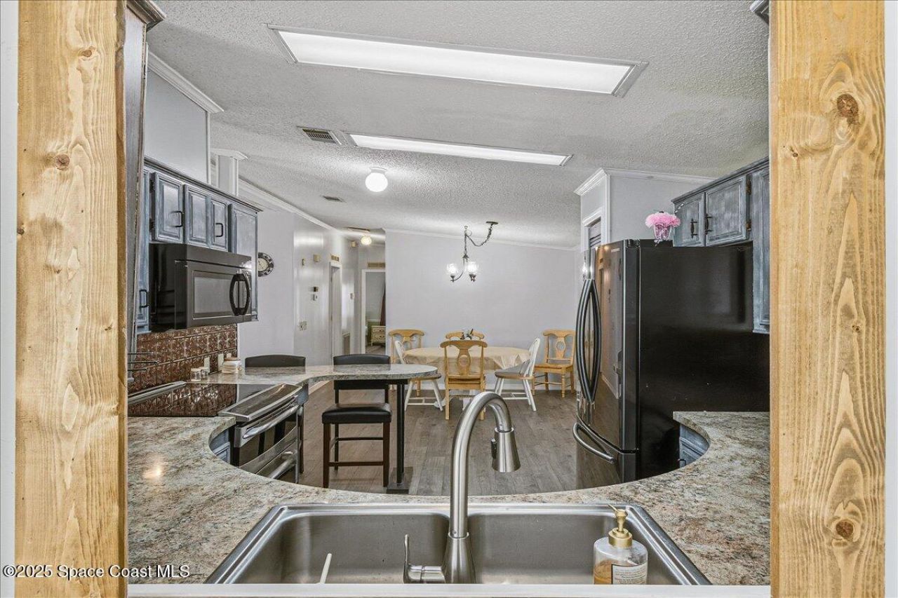 1131 Tequesta Drive, Barefoot Bay, FL 32976 Photo