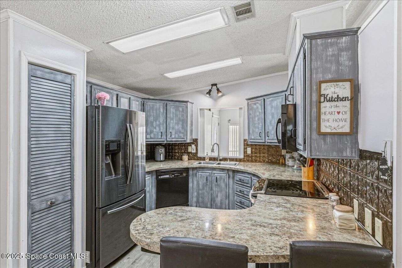 1131 Tequesta Drive, Barefoot Bay, FL 32976 Photo