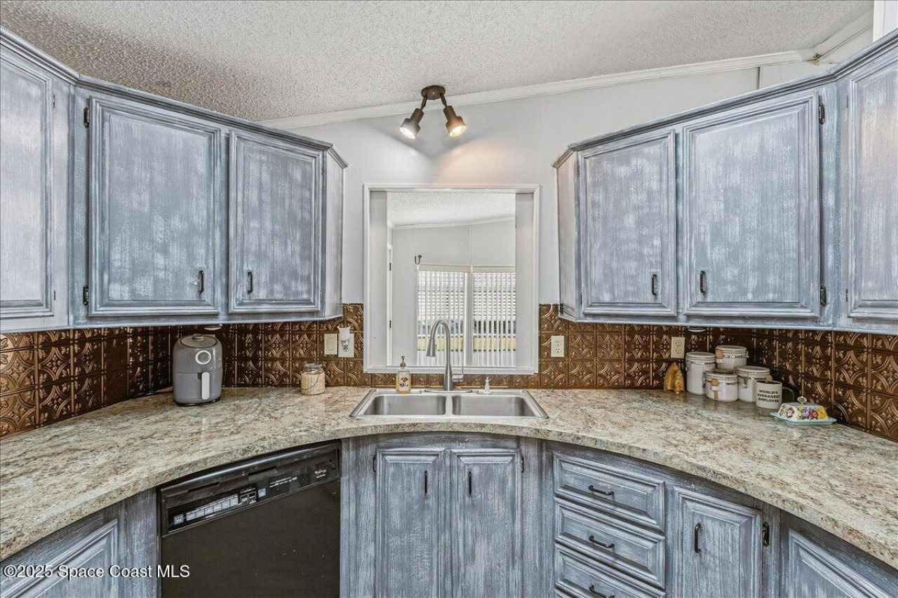 1131 Tequesta Drive, Barefoot Bay, FL 32976 Photo