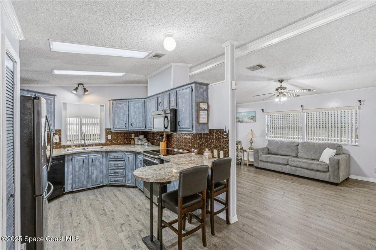 1131 Tequesta Drive, Barefoot Bay, FL 32976 Photo