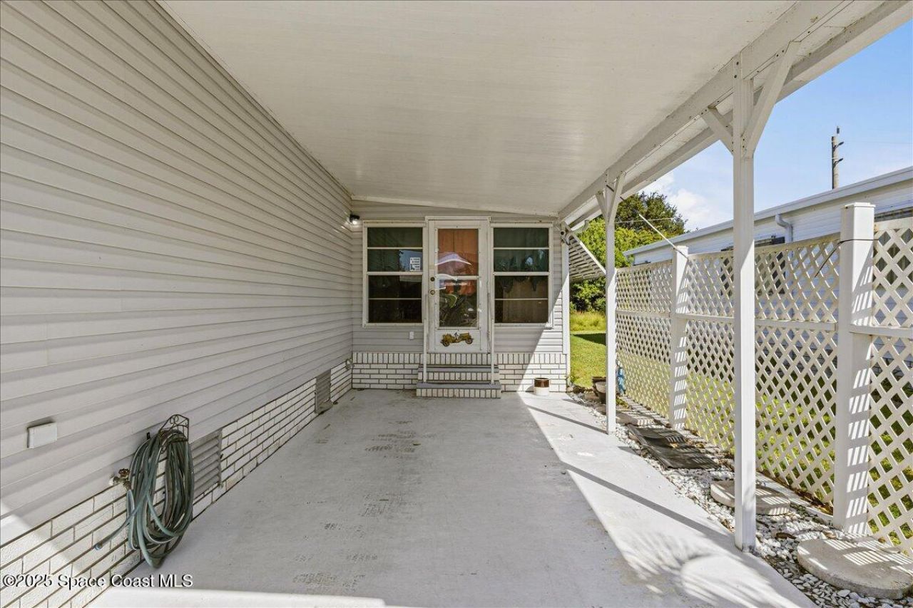 1131 Tequesta Drive, Barefoot Bay, FL 32976 Photo