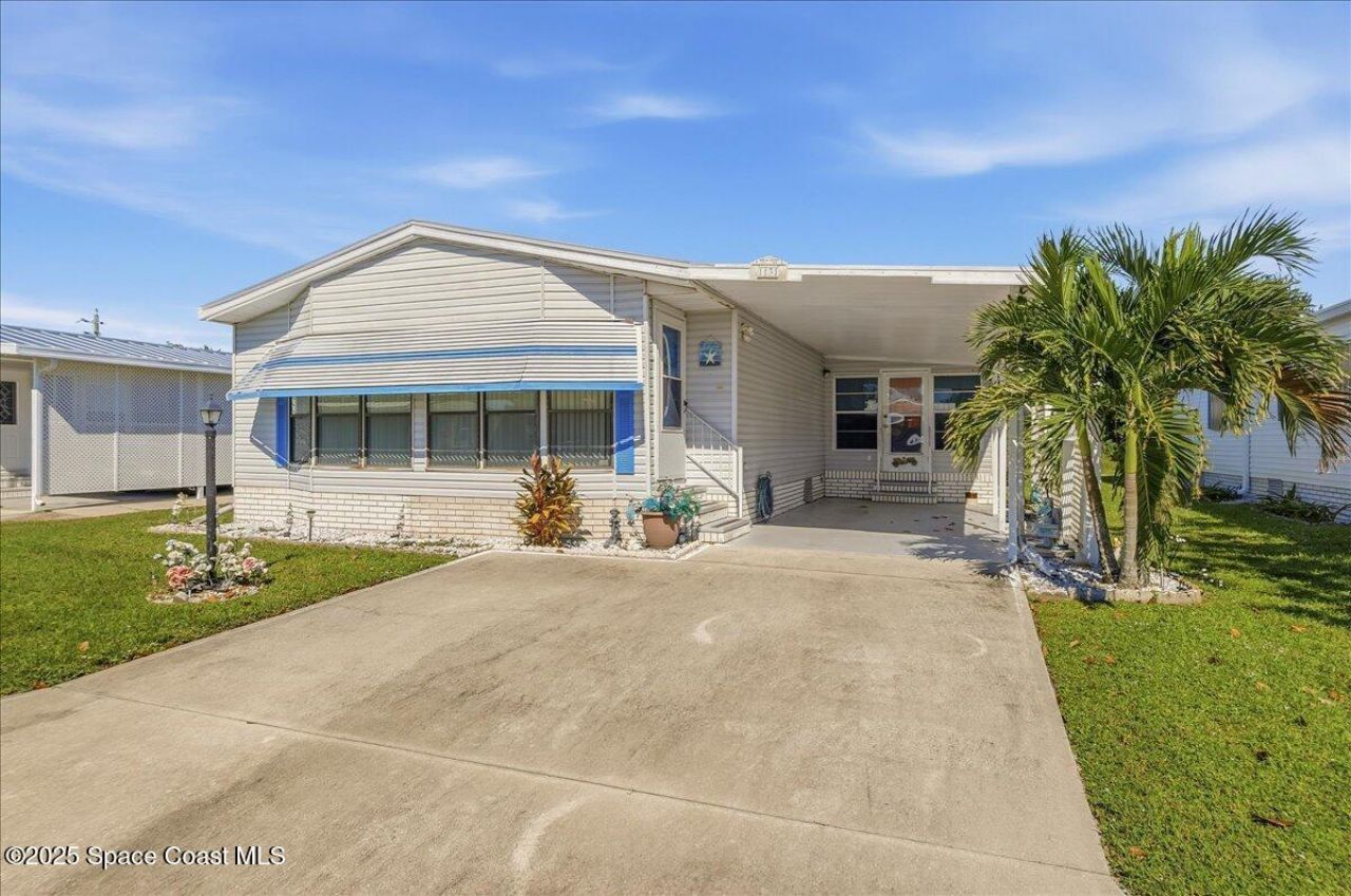 1131 Tequesta Drive, Barefoot Bay, FL 32976 Photo