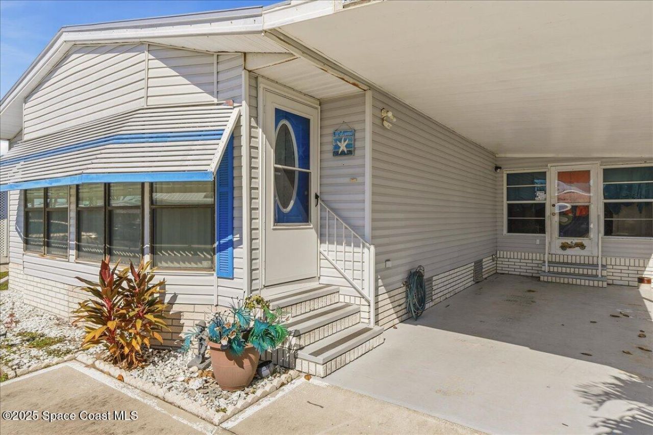 1131 Tequesta Drive, Barefoot Bay, FL 32976 Photo