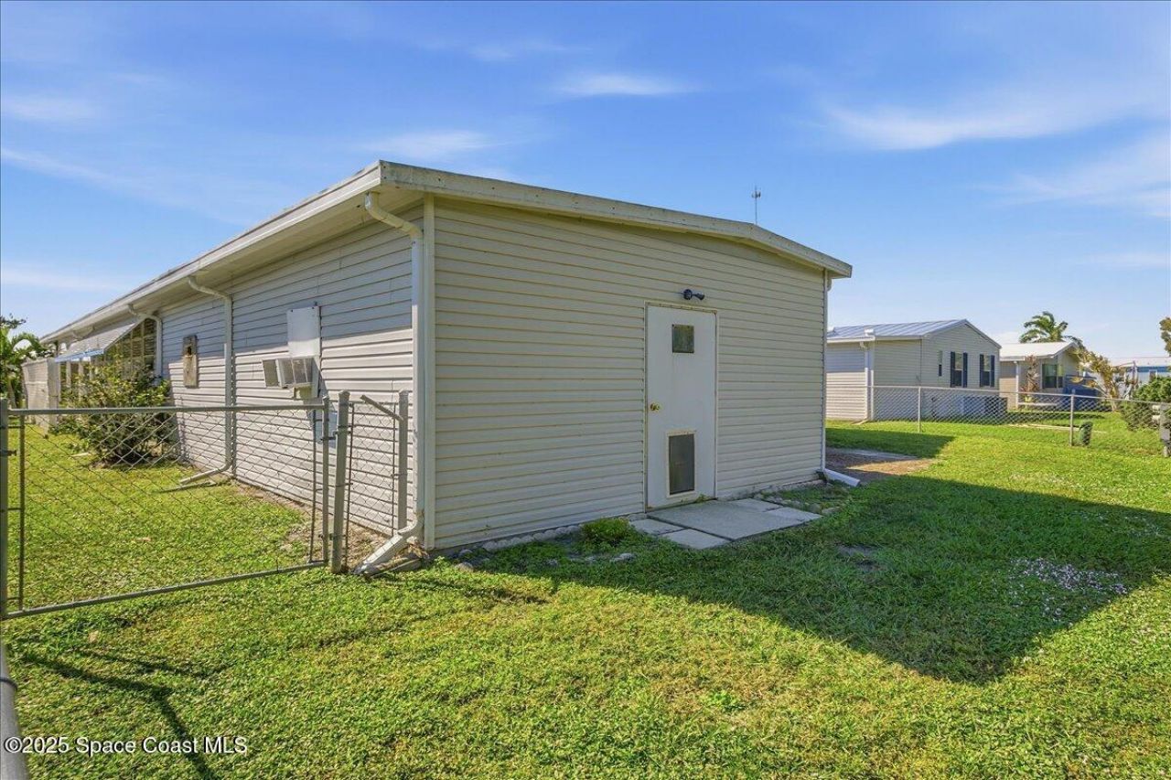 1131 Tequesta Drive, Barefoot Bay, FL 32976 Photo