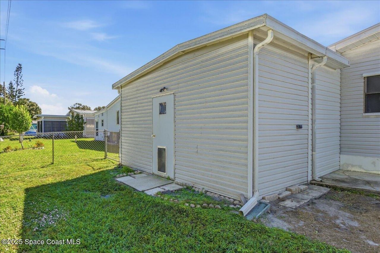 1131 Tequesta Drive, Barefoot Bay, FL 32976 Photo