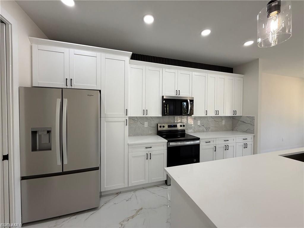 656 Foxchase Dr, Lehigh Acres, FL 33974 Photo