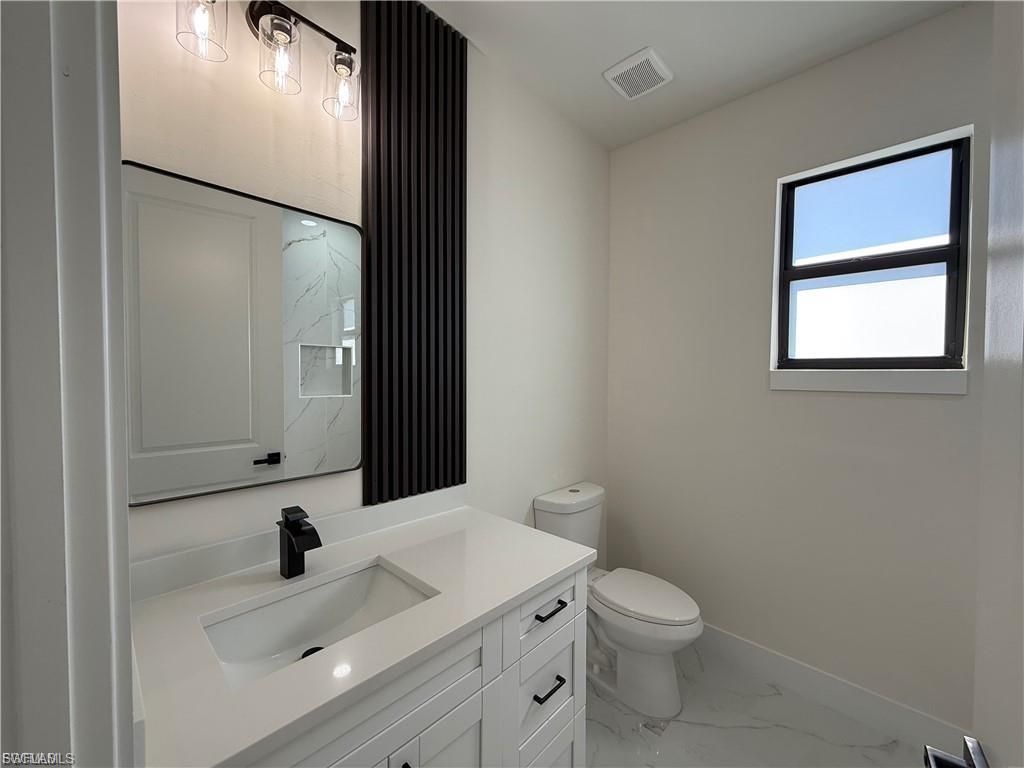 656 Foxchase Dr, Lehigh Acres, FL 33974 Photo