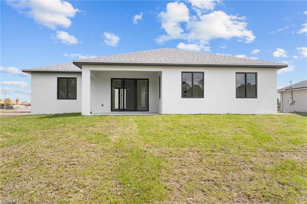 656 Foxchase Dr, Lehigh Acres, FL 33974 Photo