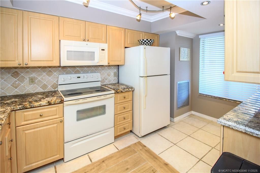 4720 NE Sandpebble Trace, Unit 403, Stuart, FL 34996 Photo