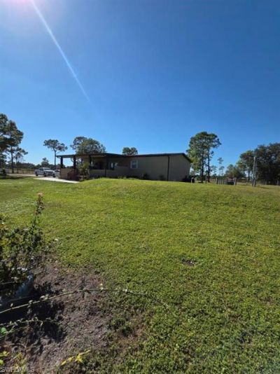 1860 Poinsettia Ave , Lehigh Acres, FL 33972 Photo