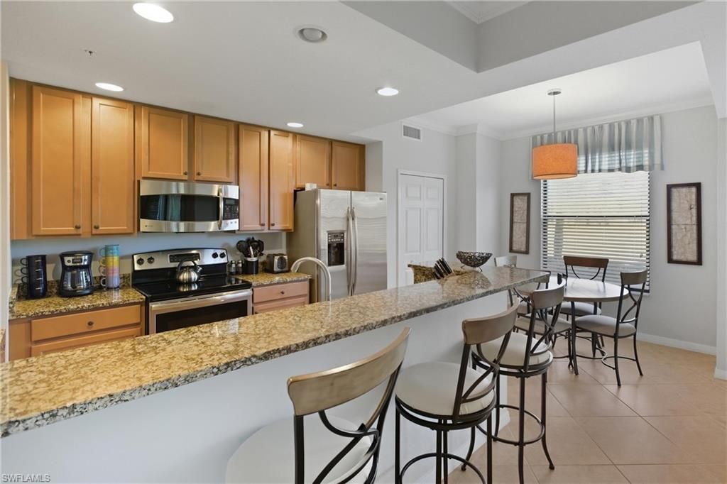 9844 Venezia Cir, Unit 714, Naples, FL 34113 Photo