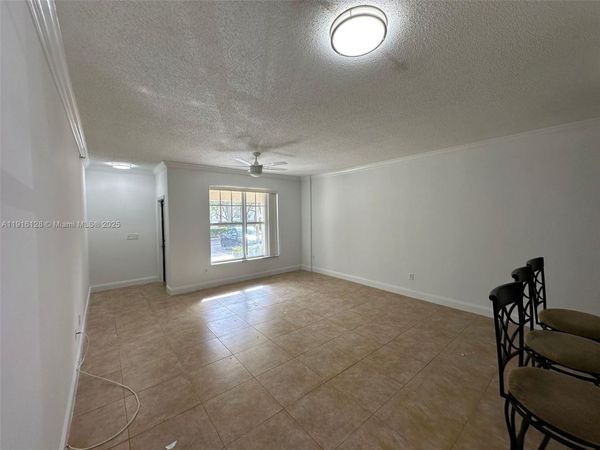 6020 W Sample Rd, Unit 104, Coral Springs, FL 33067