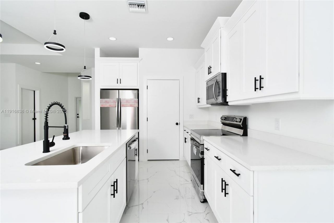 1905 Charles Ave N, Lehigh Acres, FL 33971 Photo