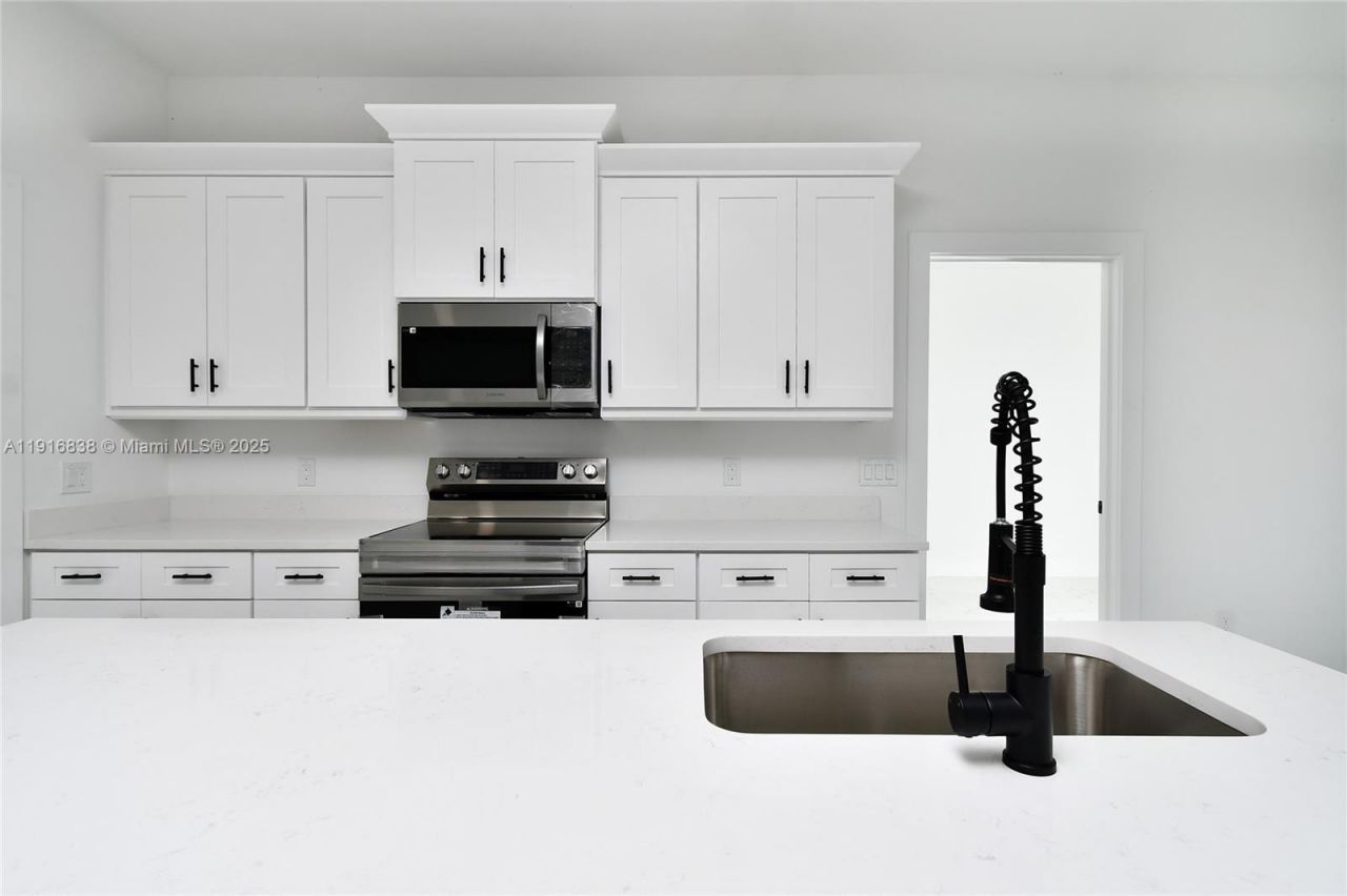 1905 Charles Ave N, Lehigh Acres, FL 33971 Photo