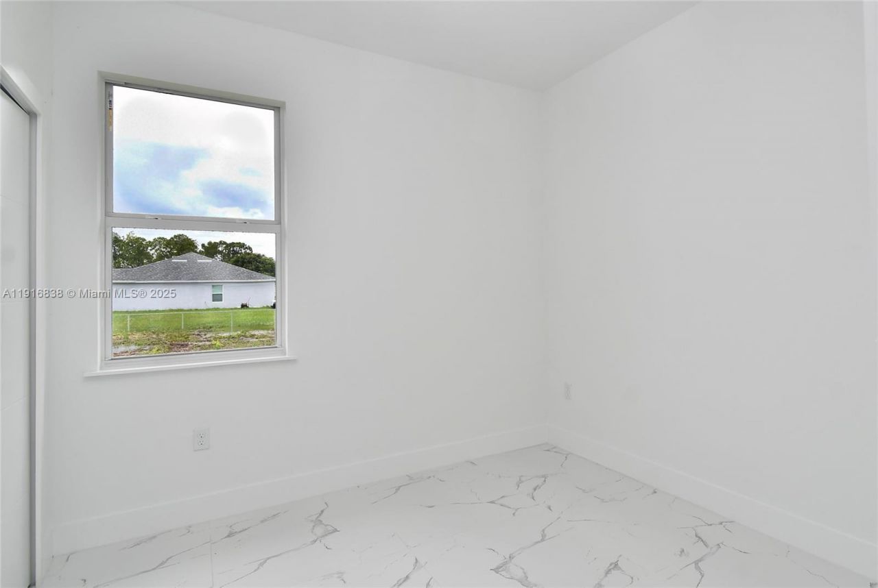 1905 Charles Ave N, Lehigh Acres, FL 33971 Photo