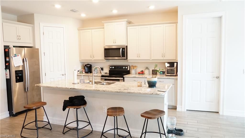 860 Heather Lake Ave, Cape Coral, FL 33993 Photo