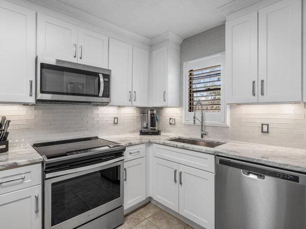 2420 Deer Creek Country Club Boulevard, Unit 205-D, Deerfield Beach, FL 33442