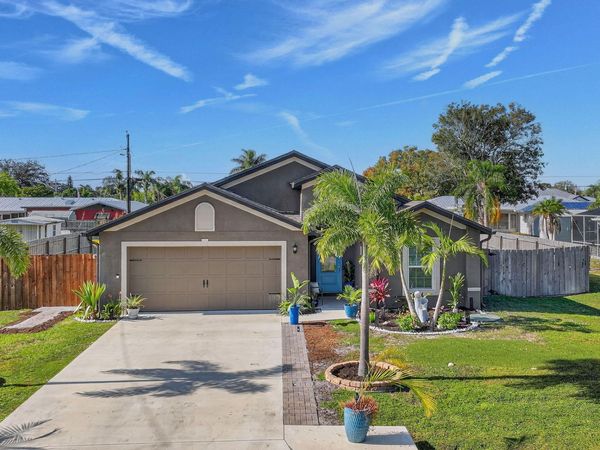 452 SE Asbury Lane, Port St. Lucie, FL 34983