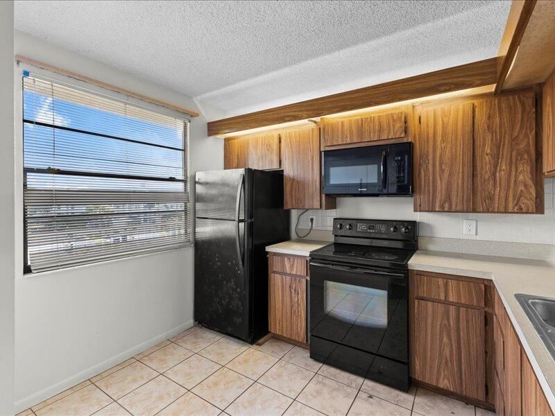 3501 Village Boulevard, Unit 406, West Palm Beach, FL 33409 Photo