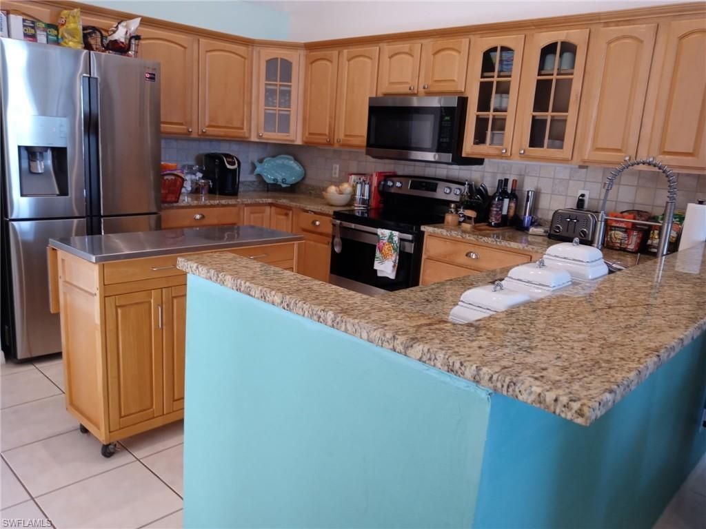 3184 Stringfellow Rd, Saint James City, FL 33956 Photo