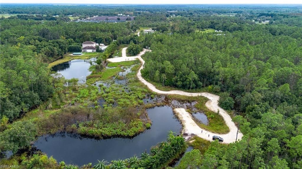 1065 Sanctuary Rd, Naples, FL 34120 Photo