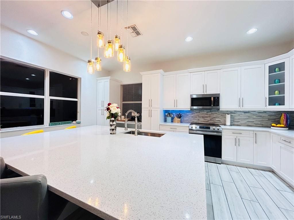 2675 Blue Cypress Lake Ct, Cape Coral, FL 33909 Photo