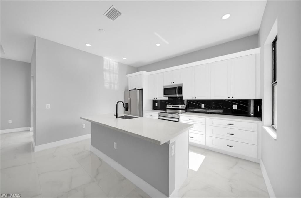 1225 NE 5th Pl, Cape Coral, FL 33909 Photo
