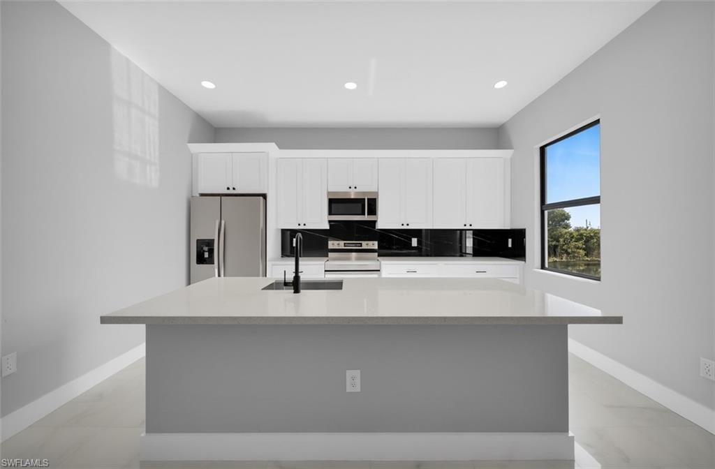 1225 NE 5th Pl, Cape Coral, FL 33909 Photo