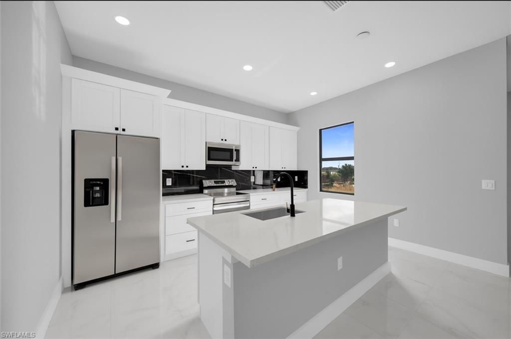 1225 NE 5th Pl, Cape Coral, FL 33909 Photo