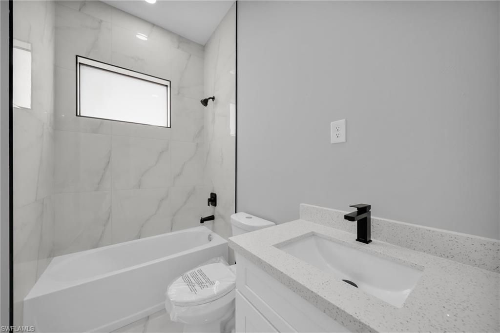 1225 NE 5th Pl, Cape Coral, FL 33909 Photo