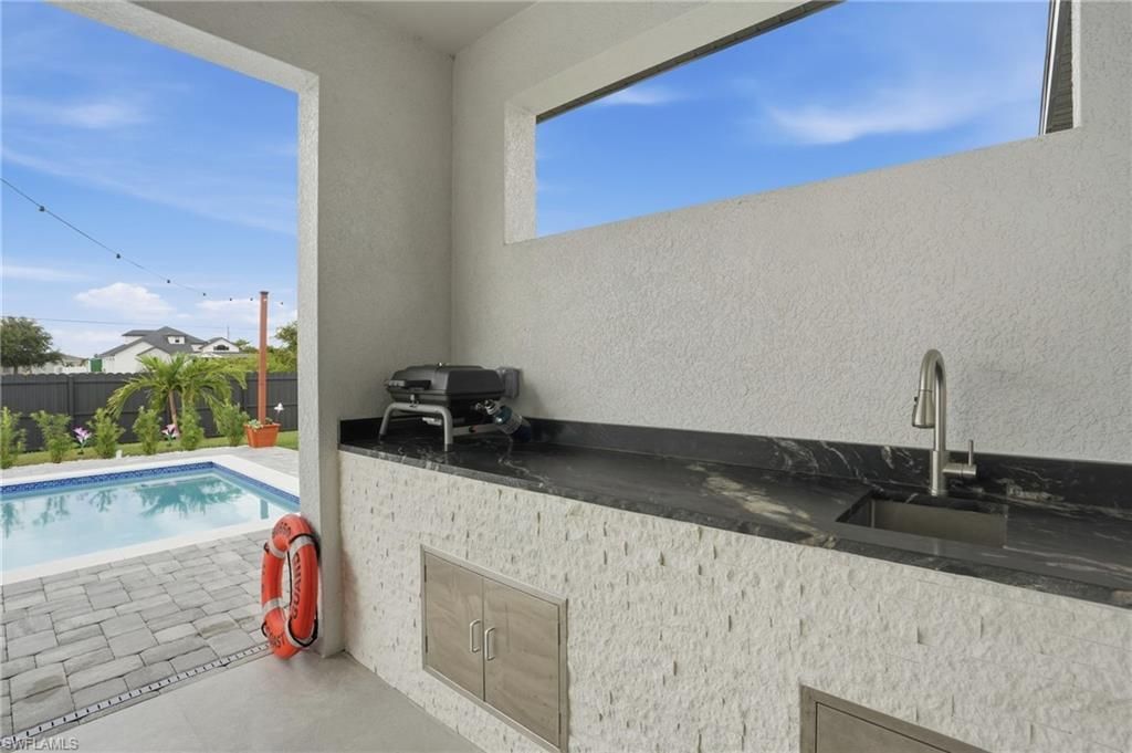 1720 NW 15th Pl, Cape Coral, FL 33993 Photo