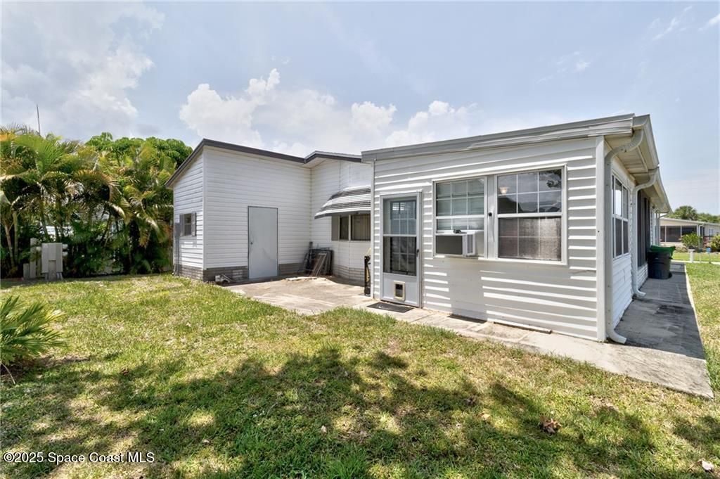729 Gladiolus Drive, Barefoot Bay, FL 32976 Photo
