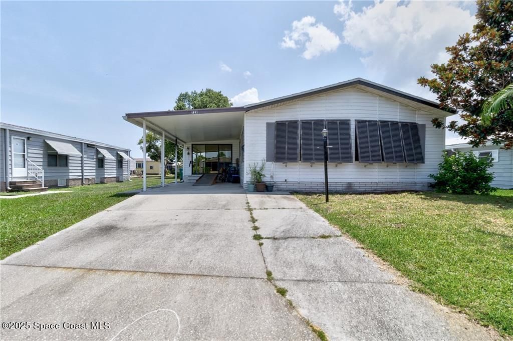 729 Gladiolus Drive, Barefoot Bay, FL 32976 Photo