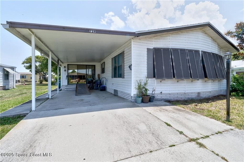 729 Gladiolus Drive, Barefoot Bay, FL 32976 Photo