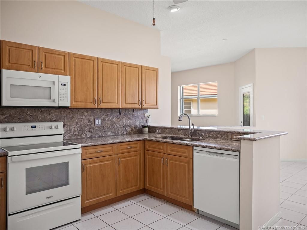 3815 SW Whispering Sound Drive, Palm City, FL 34990 Photo