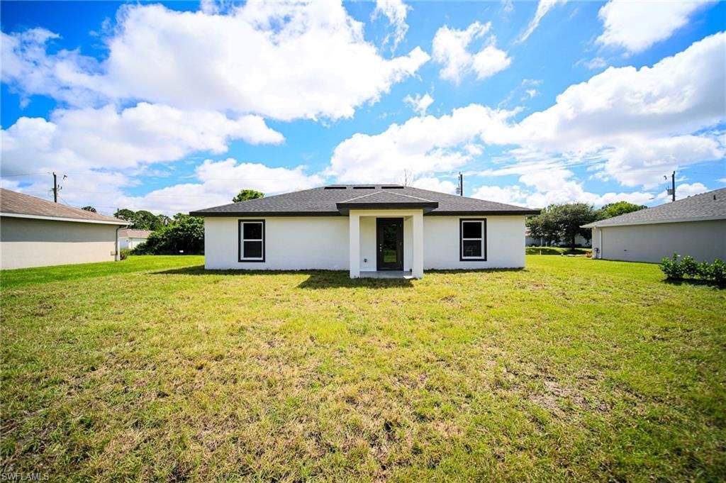 710 Theodore Vail St E, Lehigh Acres, FL 33974 Photo