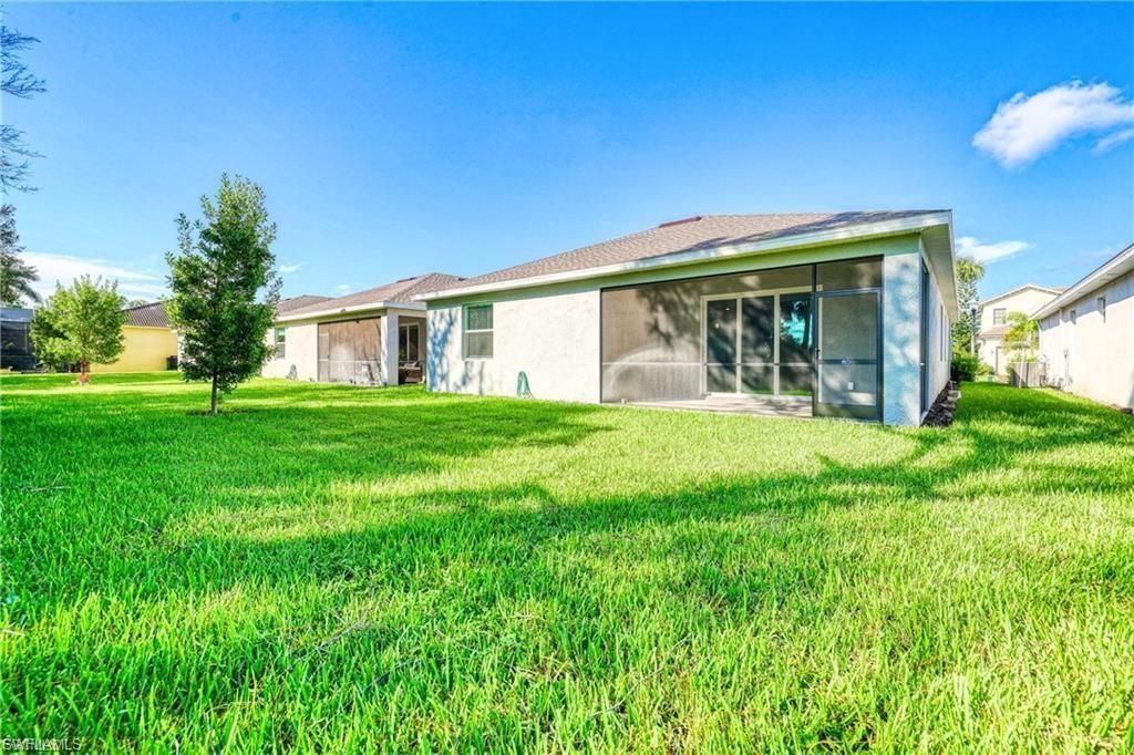 9146 Leatherwood Loop, Lehigh Acres, FL 33936 Photo