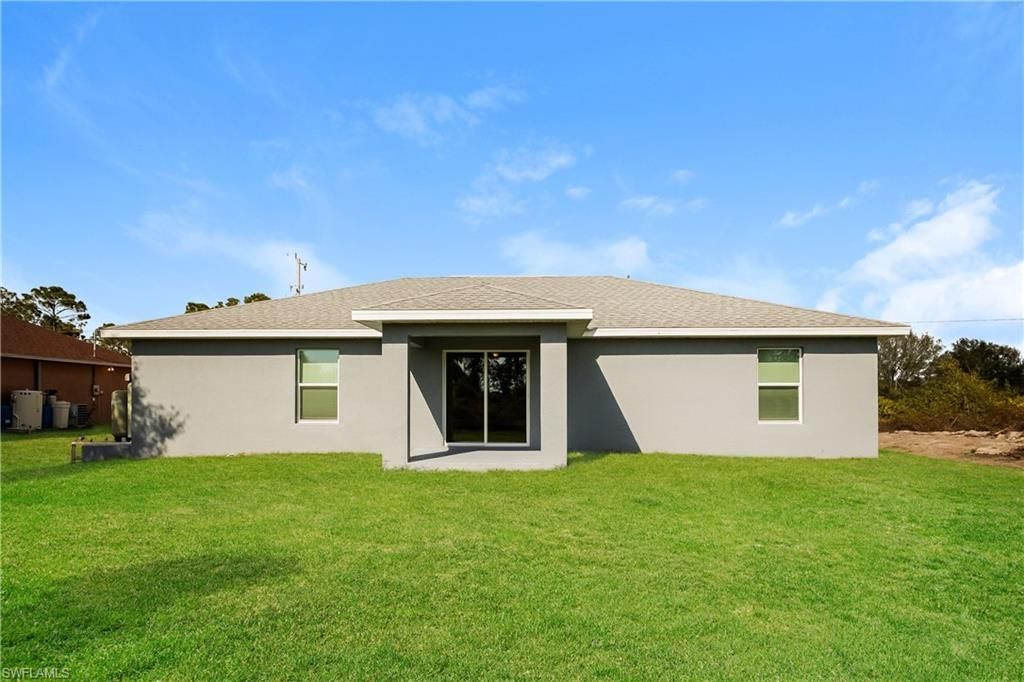858 Carbon St E, Lehigh Acres, FL 33974 Photo