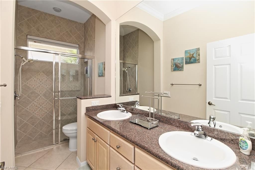 1901 Winding Oaks Way, Naples, FL 34109 Photo