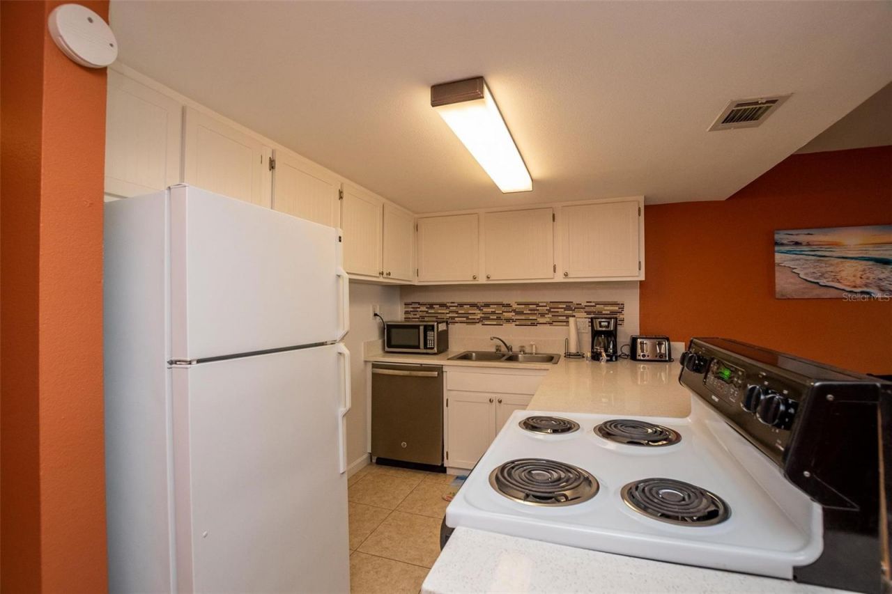 4849 Saxon Drive, Unit C202, New Smyrna Beach, FL 32169 Photo