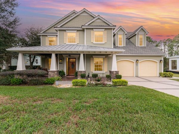 404 LONG AND WINDING ROAD, HOWEY IN THE HILLS, FL 34737