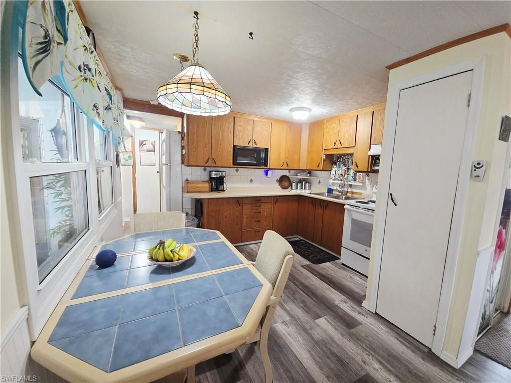 23 Enchanting Blvd, Naples, FL 34112 Photo