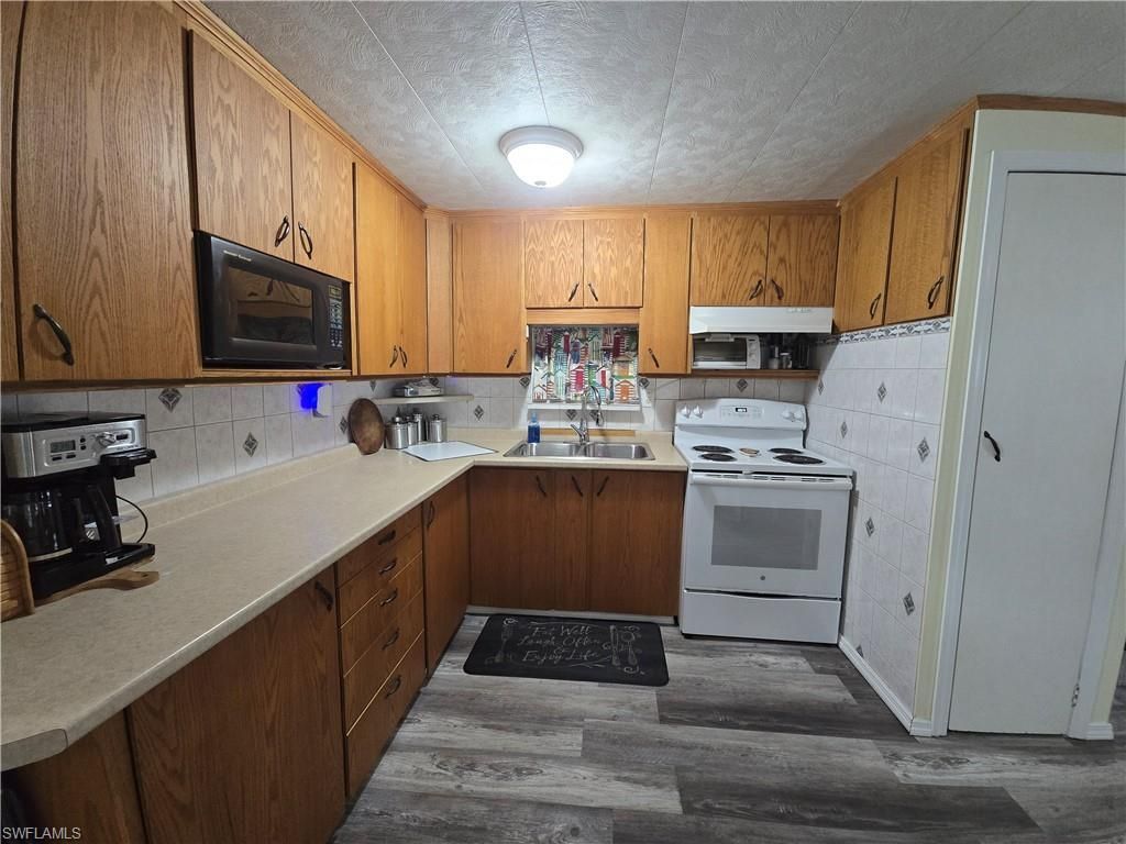 23 Enchanting Blvd, Naples, FL 34112 Photo