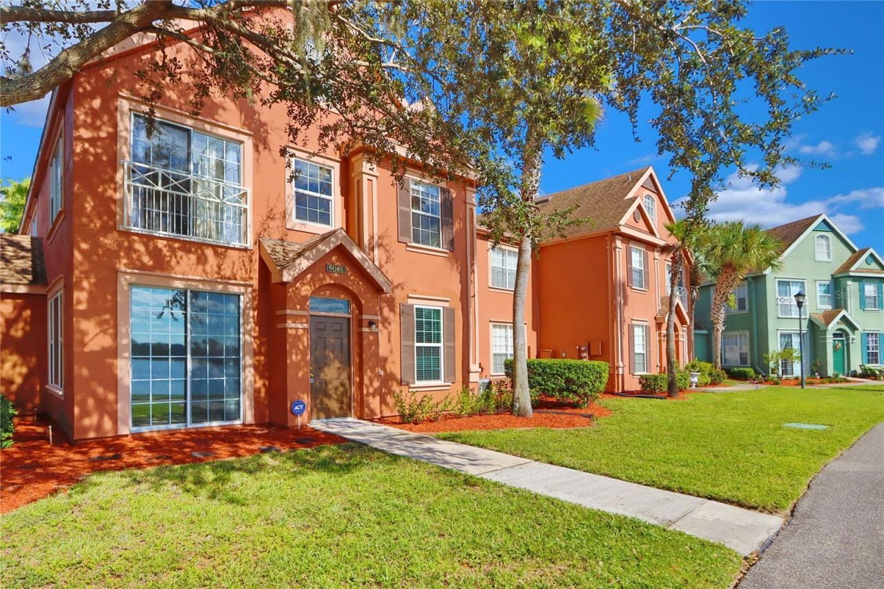 9088 Lake Chase Island Way, Unit 9088, Tampa, FL 33626 Main Photo